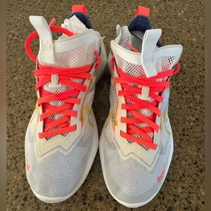 Woman’s Nike White and Pink Athletic Shoes